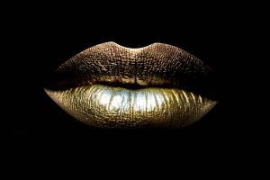 Glas schilderij gouden lippen